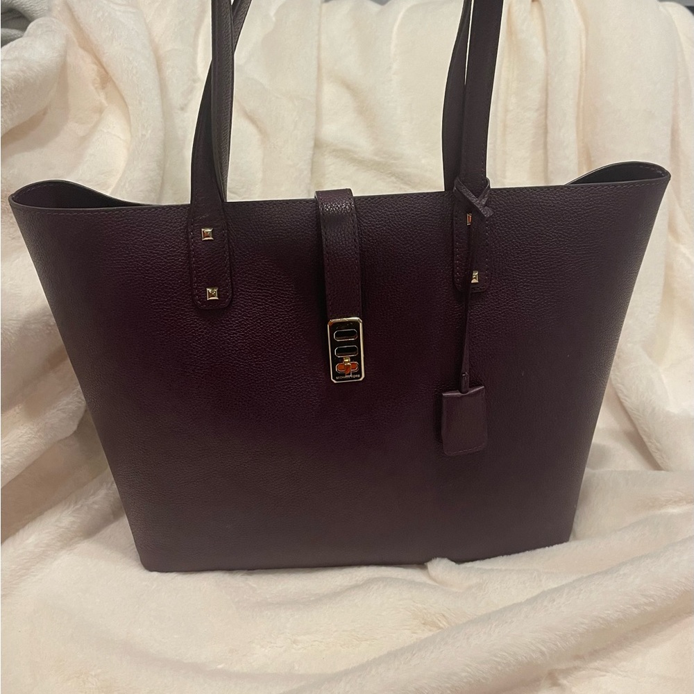 Michael Kors deep purple tote with gold closure and leather tag